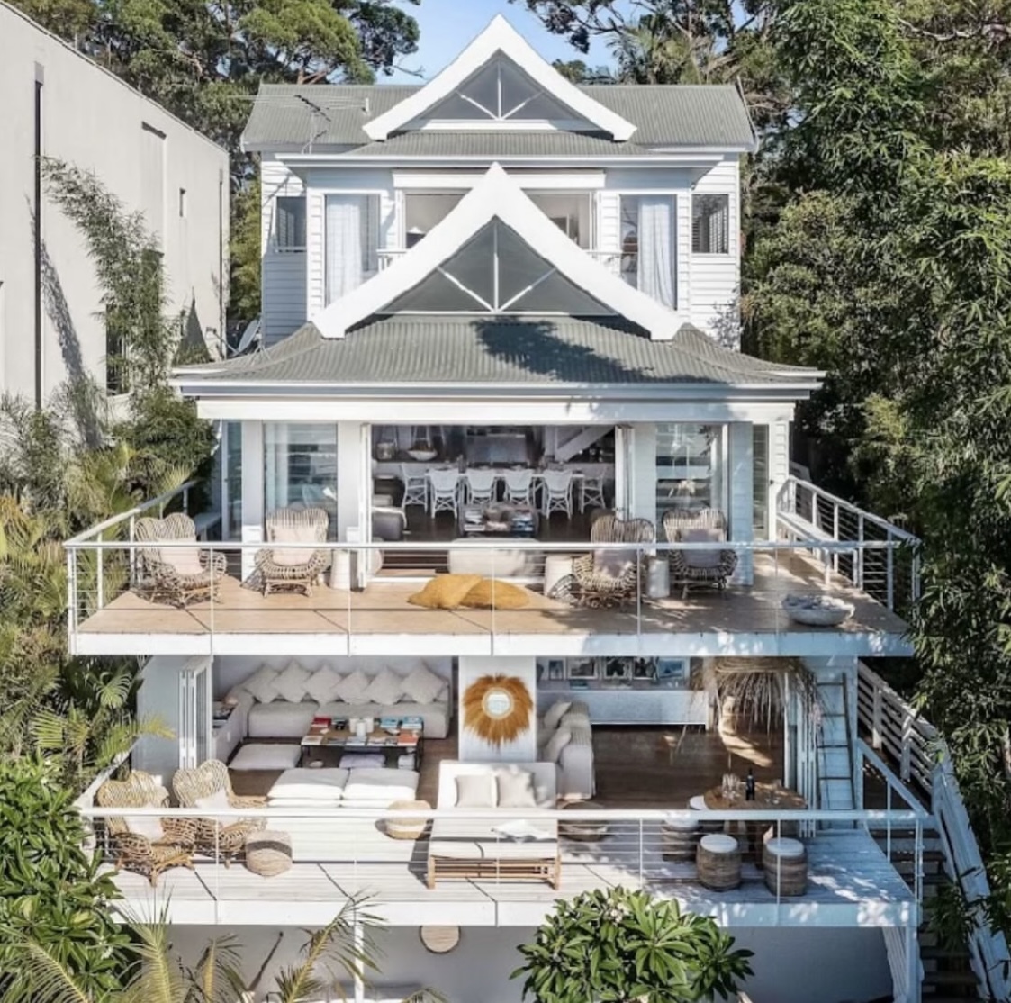 Aerial view of full multi-level property exterior