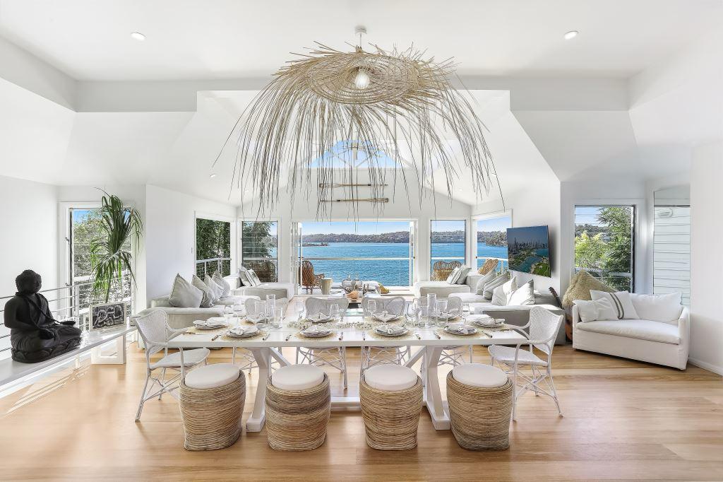 Open-plan living with cathedral ceiling and ocean views